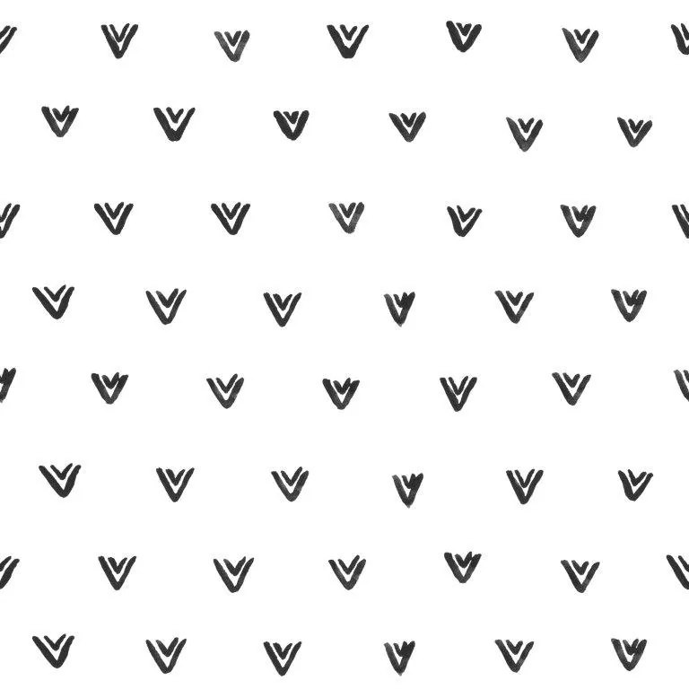 Repeating pattern of hand-drawn black chevron marks on white background