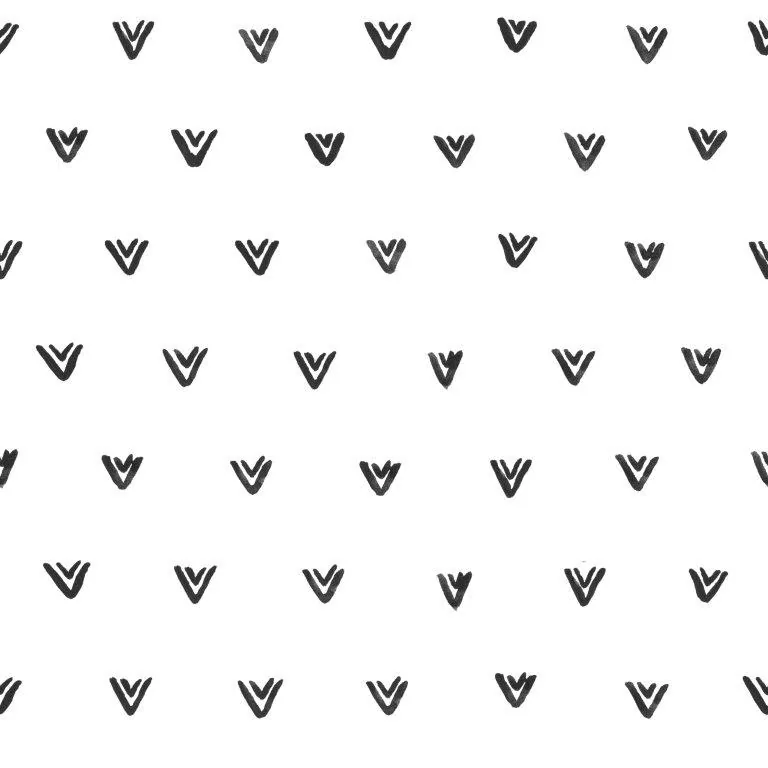 Repeating pattern of hand-drawn black chevron marks on white background