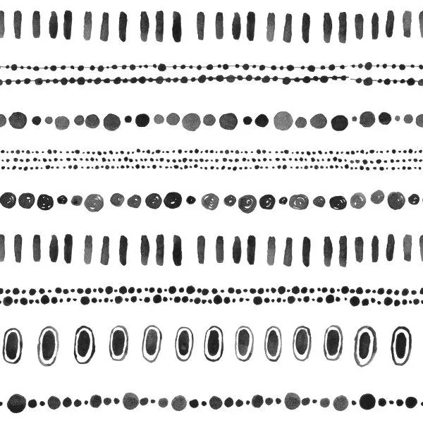 Repeating boho pattern with scattered hand-drawn dots, dashes, and circular marks in black and grey on white