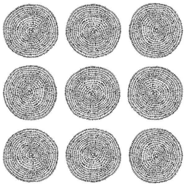 Repeating pattern of nine black and white concentric circles with radiating linear details on white background
