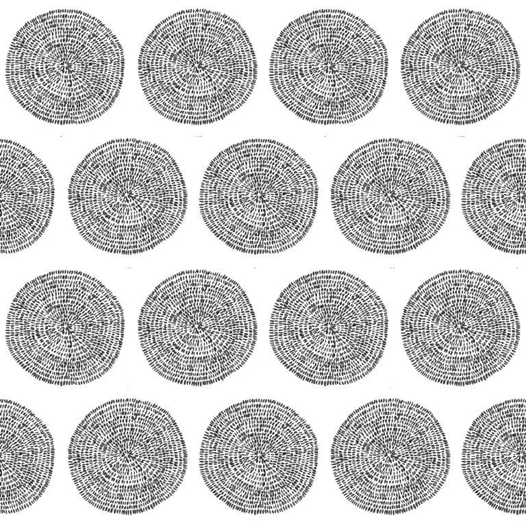 Repeating pattern of detailed circular mandalas with radiating lines in black and white