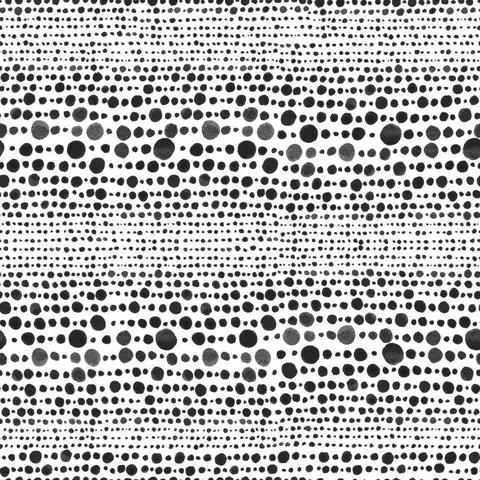 Repeating pattern of randomly sized black dots on white background