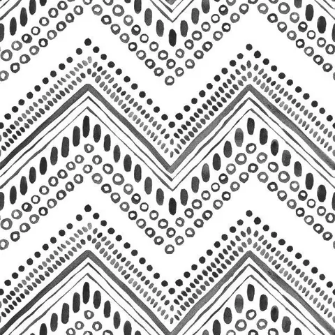 Black and white repeating chevron pattern with tribal dots and geometric lines in boho style