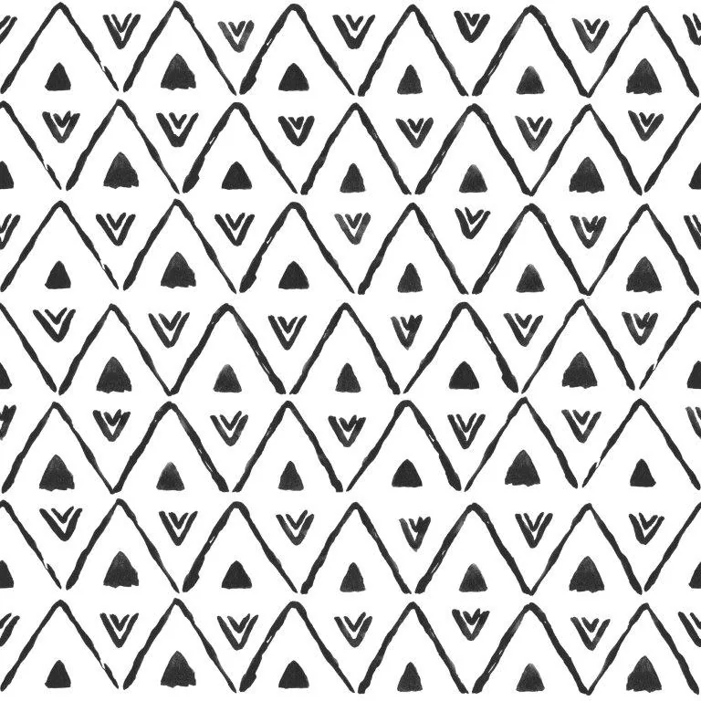 Repeating black and white geometric pattern with triangles and mountain peaks arranged in vertical columns