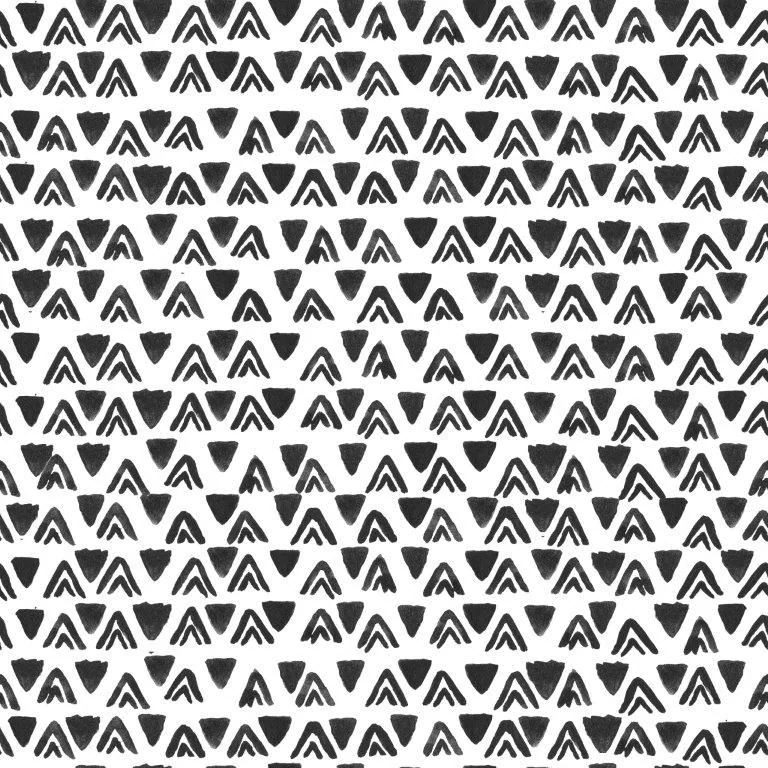 Black and white repeating pattern of filled and outlined triangles arranged in geometric rows
