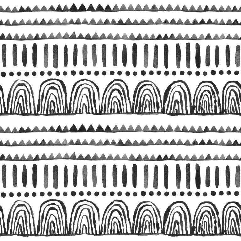 Repeating black and white tribal pattern with triangles, vertical dashes, dots, and concentric arches.