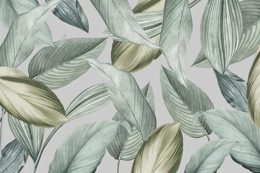 Repeating pattern of hand-drawn elongated leaves in varying shades of green and cream on a light background