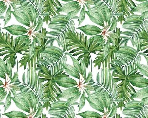 Repeating pattern of green tropical palm and fern fronds with watercolor texture on white background