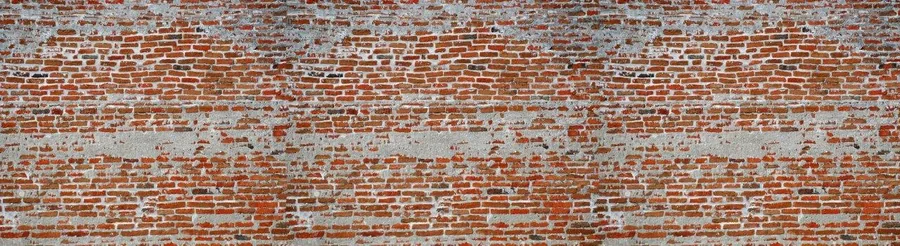 Repeating weathered red brick wall pattern with grey mortar joints and distressed surface texture