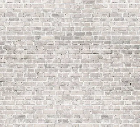 Light cream and beige brick wall texture with white mortar grout lines in regular pattern