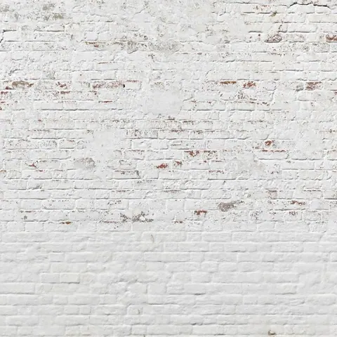 Distressed whitewashed brick wall texture with aged paint and exposed terracotta undertones
