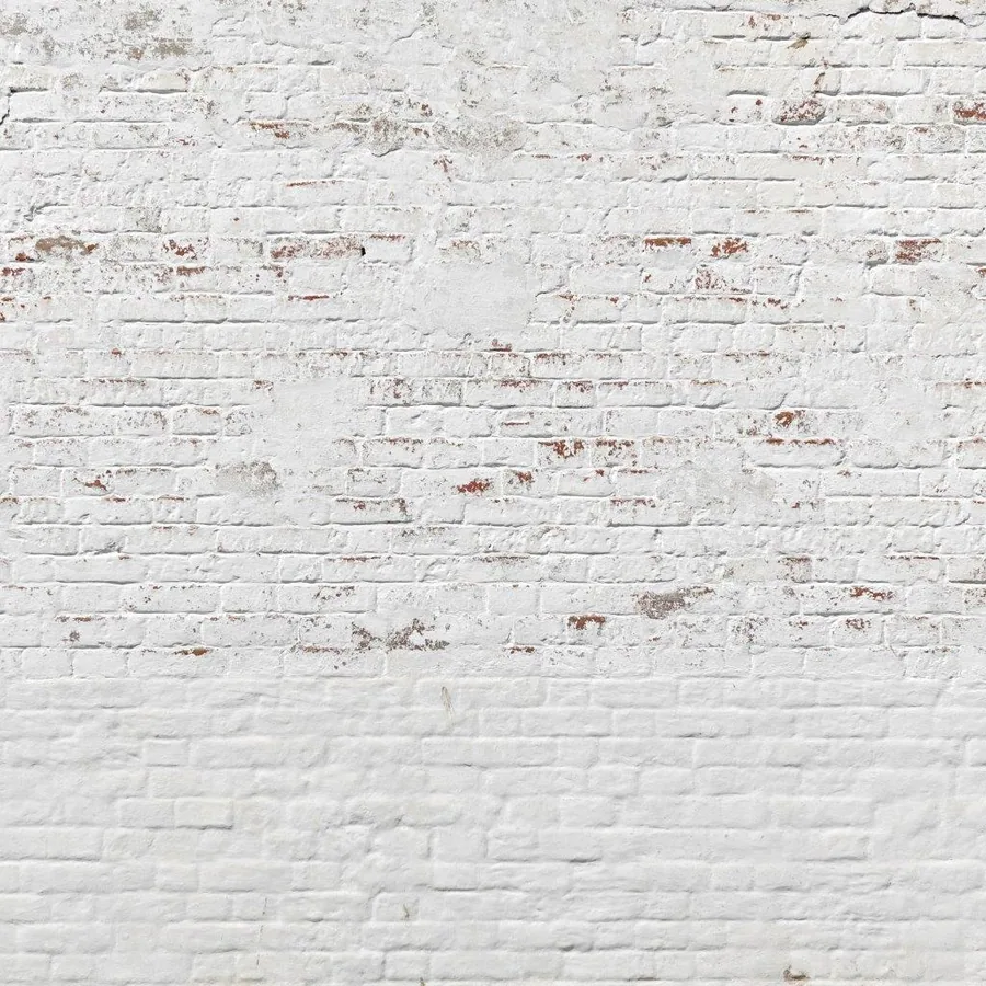 Distressed whitewashed brick wall texture with aged paint and exposed terracotta undertones