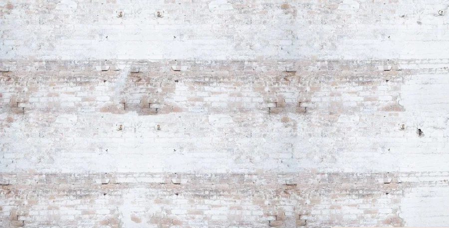 Repeating whitewashed brick pattern with cream and taupe tones and weathered texture
