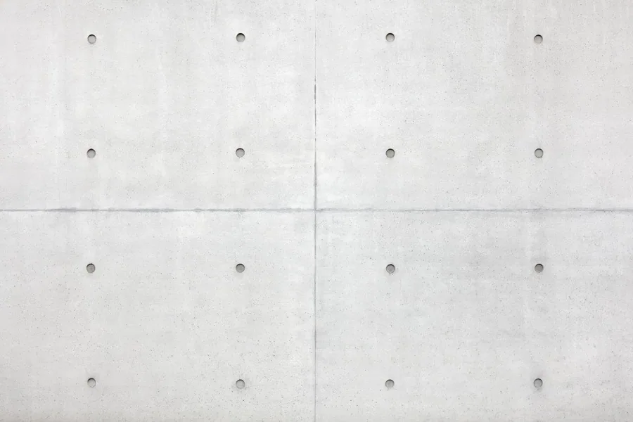 Seamless concrete panel texture with grid lines and metallic anchor points