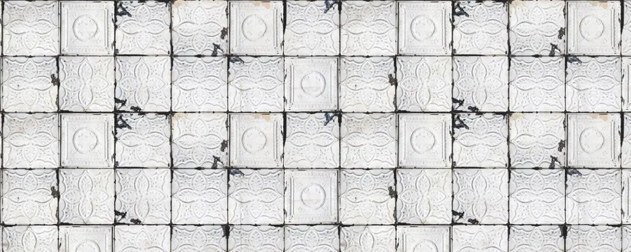 Repeating cream and taupe embossed mosaic tile pattern with raised geometric details