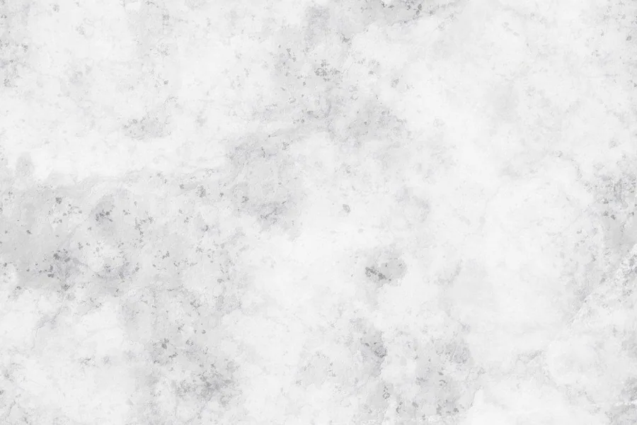 Light grey concrete texture with mottled surface and fine speckles throughout