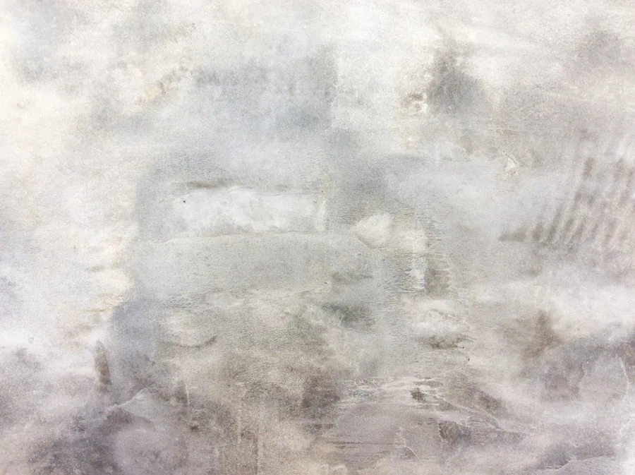 Soft gray weathered concrete texture with layered striations and subtle surface variations