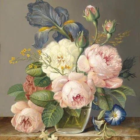 Vintage floral arrangement with pink peonies, white roses, and blue irises in a glass vase on neutral background.