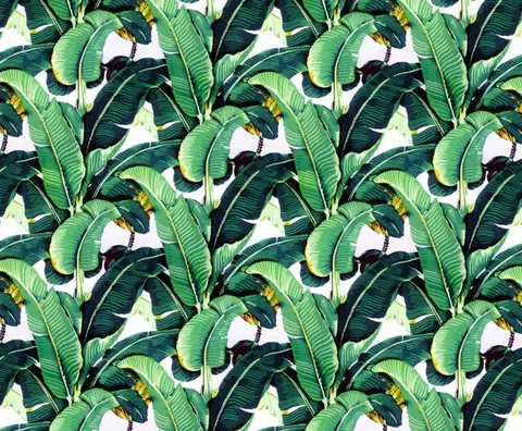 Repeating pattern of large tropical banana leaves in shades of green on white background