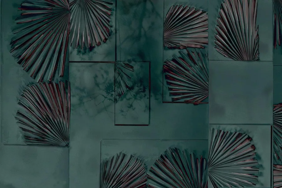 Teal and burgundy fan-shaped leaves arranged asymmetrically on textured tiles