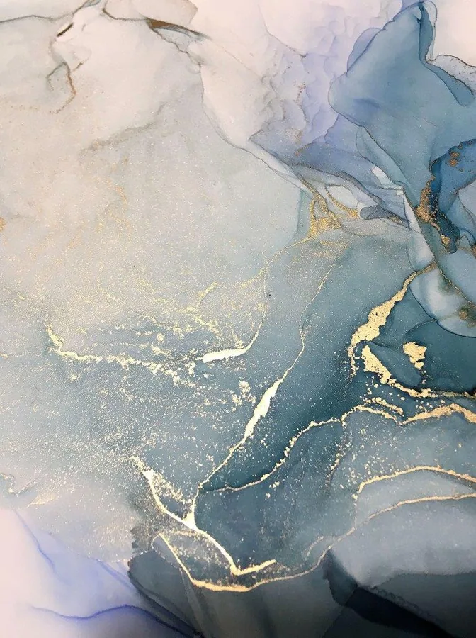 Abstract marble pattern with blue, cream, and gold ink wash effects