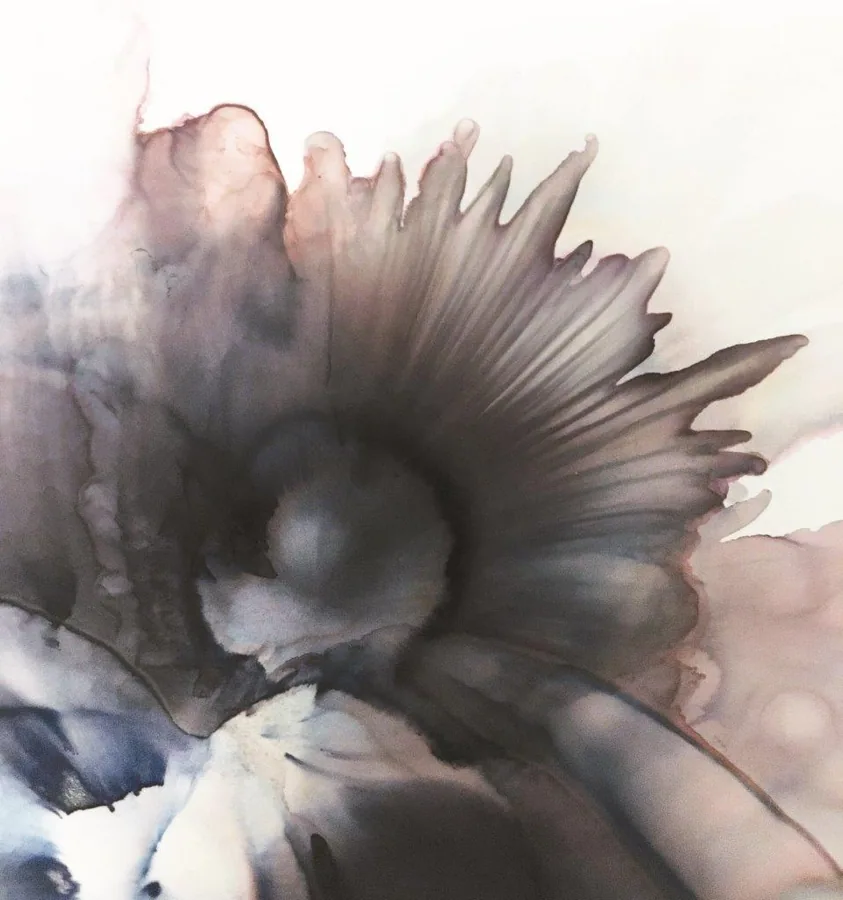 Abstract watercolor marble pattern with feathered gray and brown ink swirls on cream background