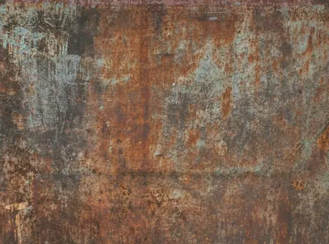 Weathered rust and verdigris metal texture with oxidized patina