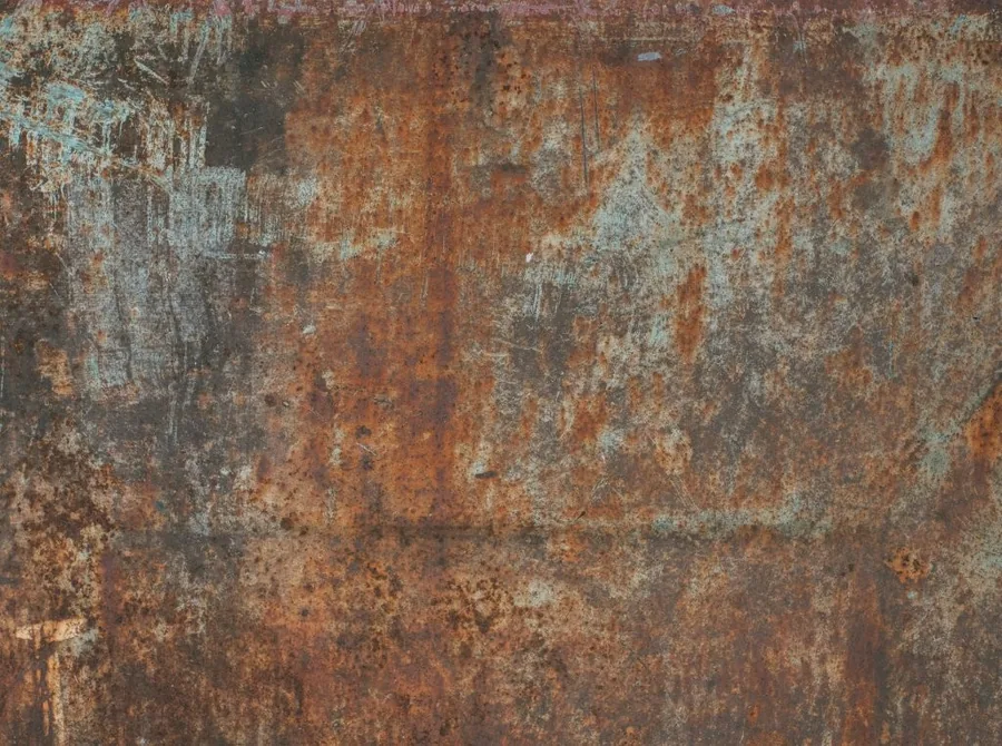 Weathered rust and verdigris metal texture with oxidized patina