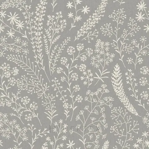 Repeating pattern of white delicate wildflowers and botanical sprigs on grey fabric background