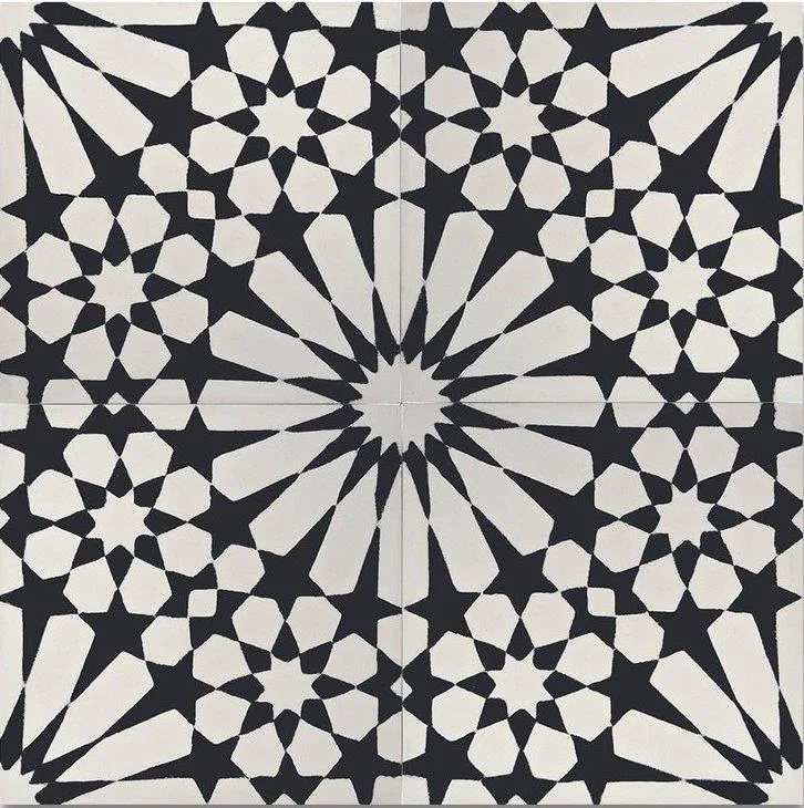 Black and cream geometric mosaic tile pattern with central starburst and radiating star motifs