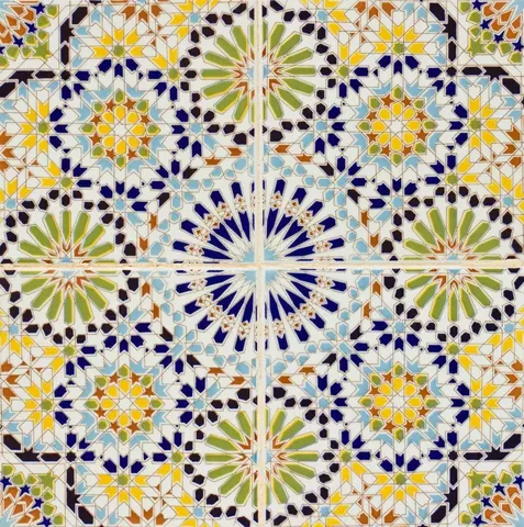Symmetrical Moroccan mosaic tile pattern with blue starburst medallions, geometric lattice, and jewel-toned accents