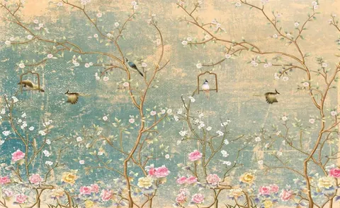 Vintage-style mural with white and pink blossoms on branches, birds, and decorative hanging cages on muted teal and cream background.