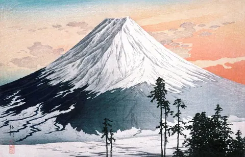 Snow-covered Mount Fuji with dark forested slopes, morning mist, and coral dawn sky with tall pine trees in foreground.