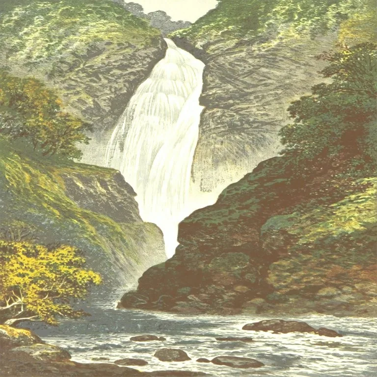Painted waterfall flowing through verdant rocky canyon with forest canopy and stream below