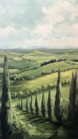 Scenic Tuscan hillside with tall cypress trees, golden fields, and distant mountains under cloudy sky