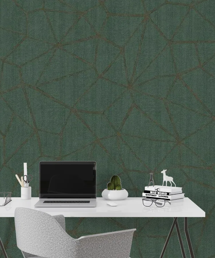 Sage green linen texture with geometric bronze branch pattern on modern office desk workspace