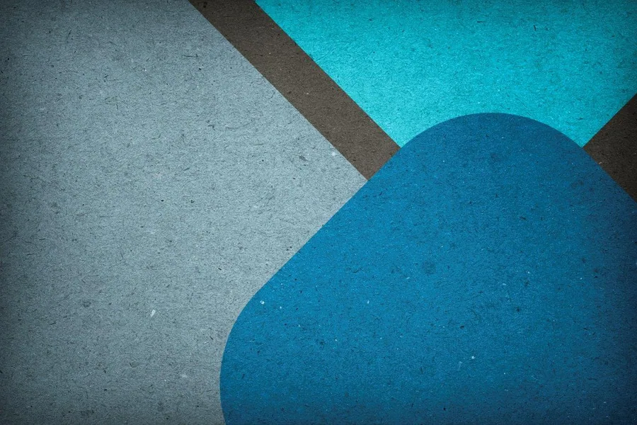 Abstract geometric wallpaper with curved shapes in turquoise, navy, and grey with vintage texture