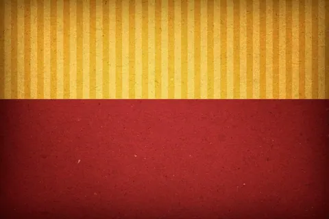 Gold striped pattern above deep red solid section with textured vintage finish