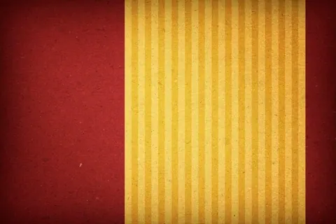 Vertical golden and cream striped wallpaper pattern with vintage texture on deep red background