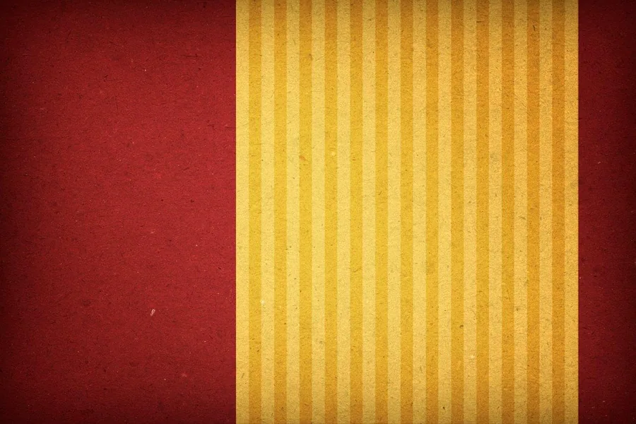 Vertical golden and cream striped wallpaper pattern with vintage texture on deep red background