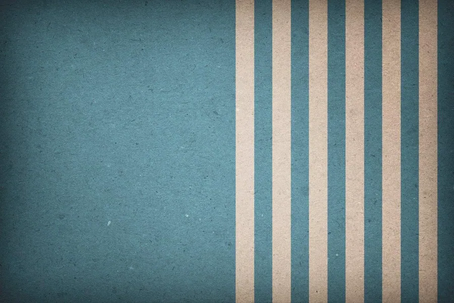 Vertical stripes in cream and teal on textured background, retro wallpaper design