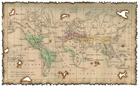 Vintage world map with ornate cartography, celestial spheres, and classical decorative engravings