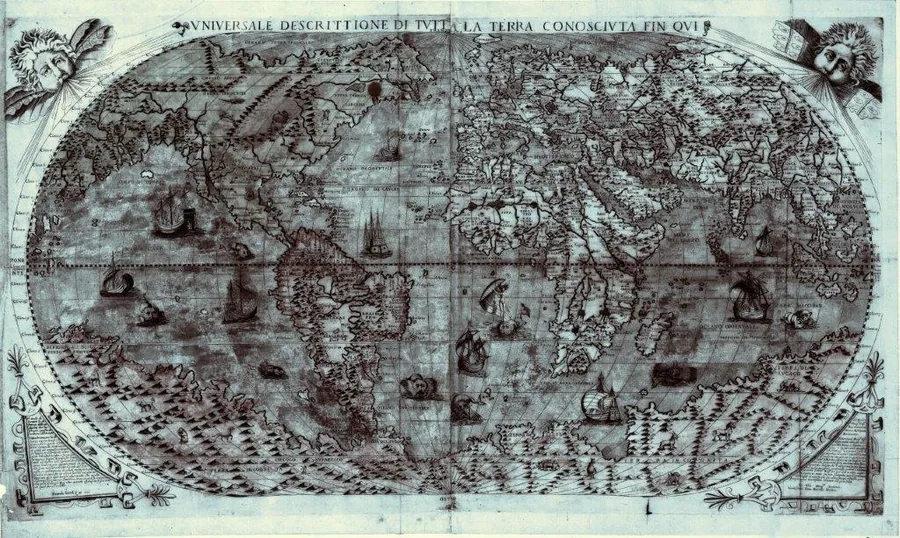 Vintage world map with ornamental details, compass roses, and sailing ships in sepia tones