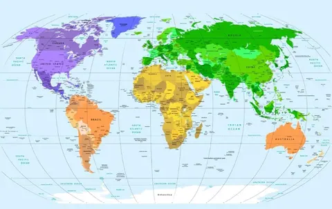 Colorful world map with countries in purple, green, gold, and orange tones on light blue ocean background