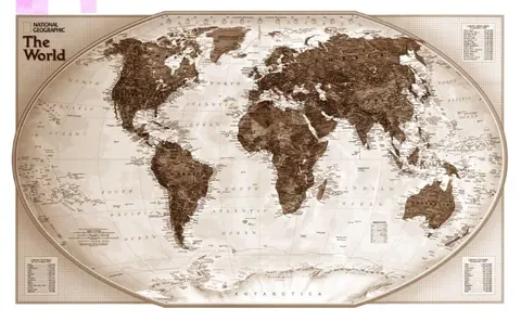 Sepia-toned vintage world map with continents, oceans, and decorative border in National Geographic style.