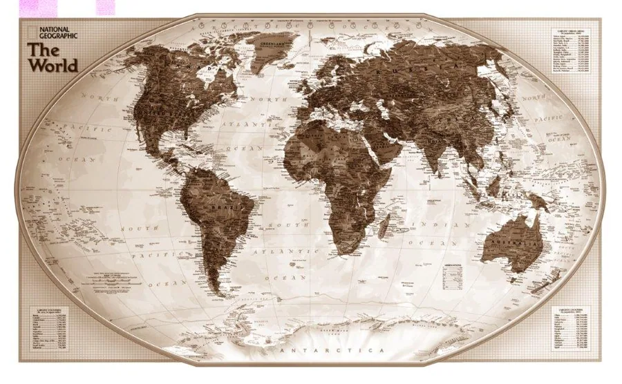 Sepia-toned vintage world map with continents, oceans, and decorative border in National Geographic style.