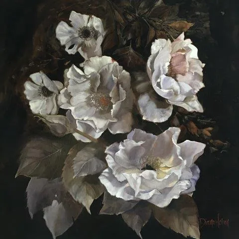Pale white and blush roses with dark green foliage against a dark background
