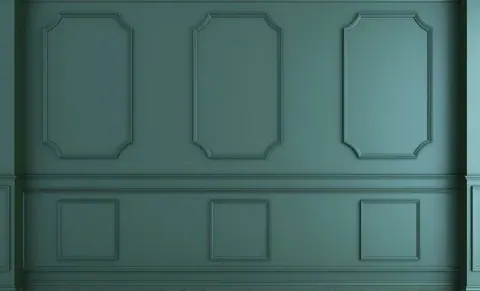 Sage green wall paneling with octagonal and square raised frame pattern