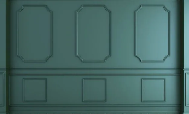 Sage green wall paneling with octagonal and square raised frame pattern