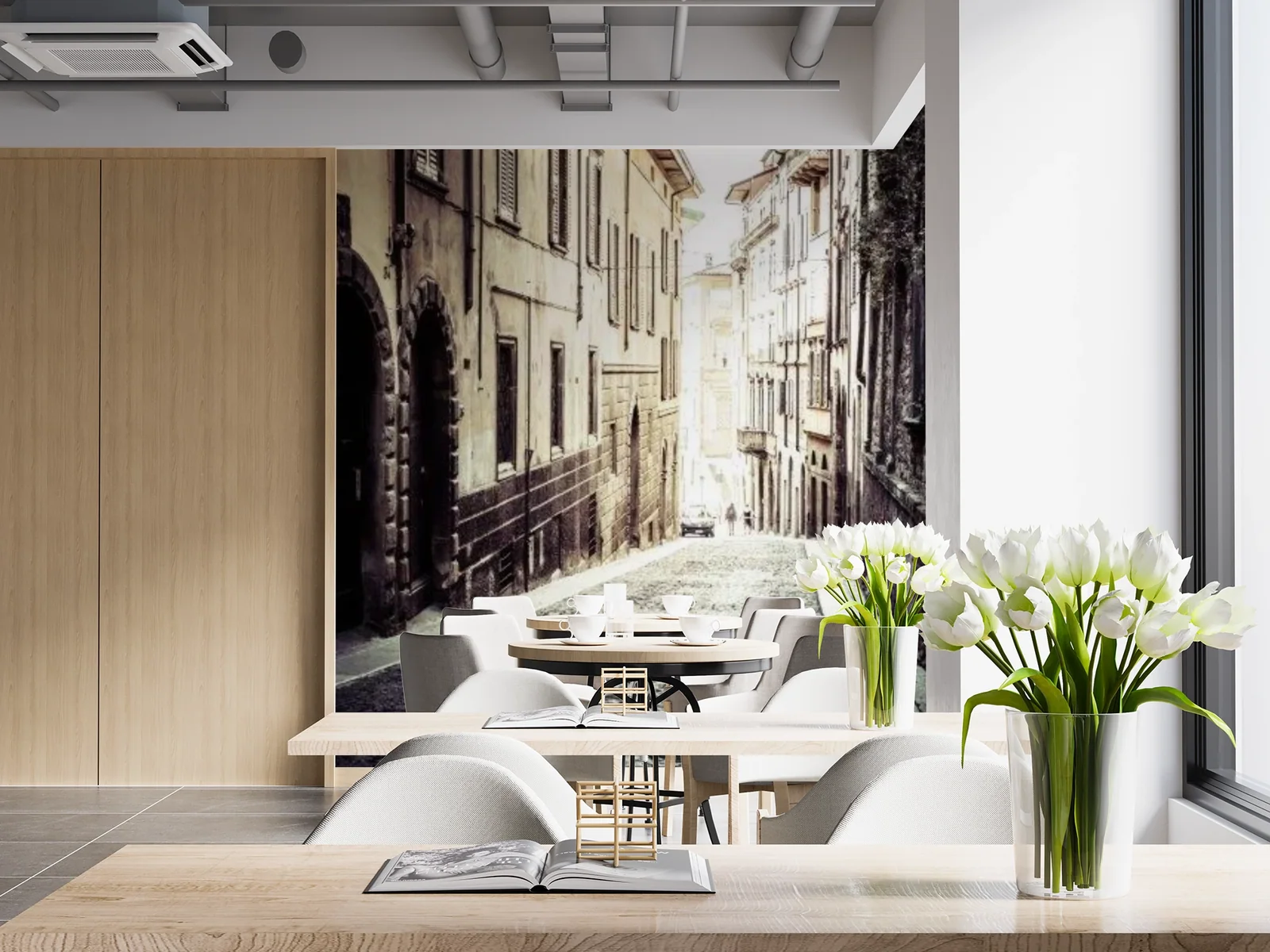 Cities wallpaper shown on a wall in a styled room
